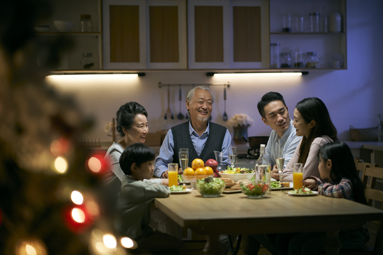 asian family having christmas dinner